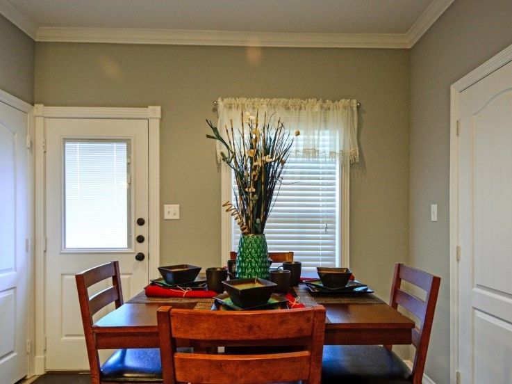 301 Southwest Parkway, Unit 314 College Station, TX 77840 - Photo 7 of 14 a table and chairs in a room