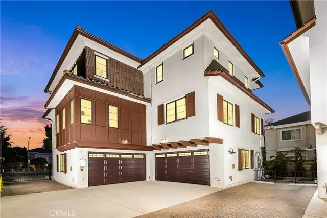 a front view of a house with a garage
