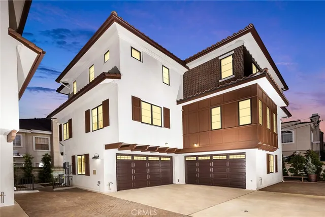 a front view of a house with parking