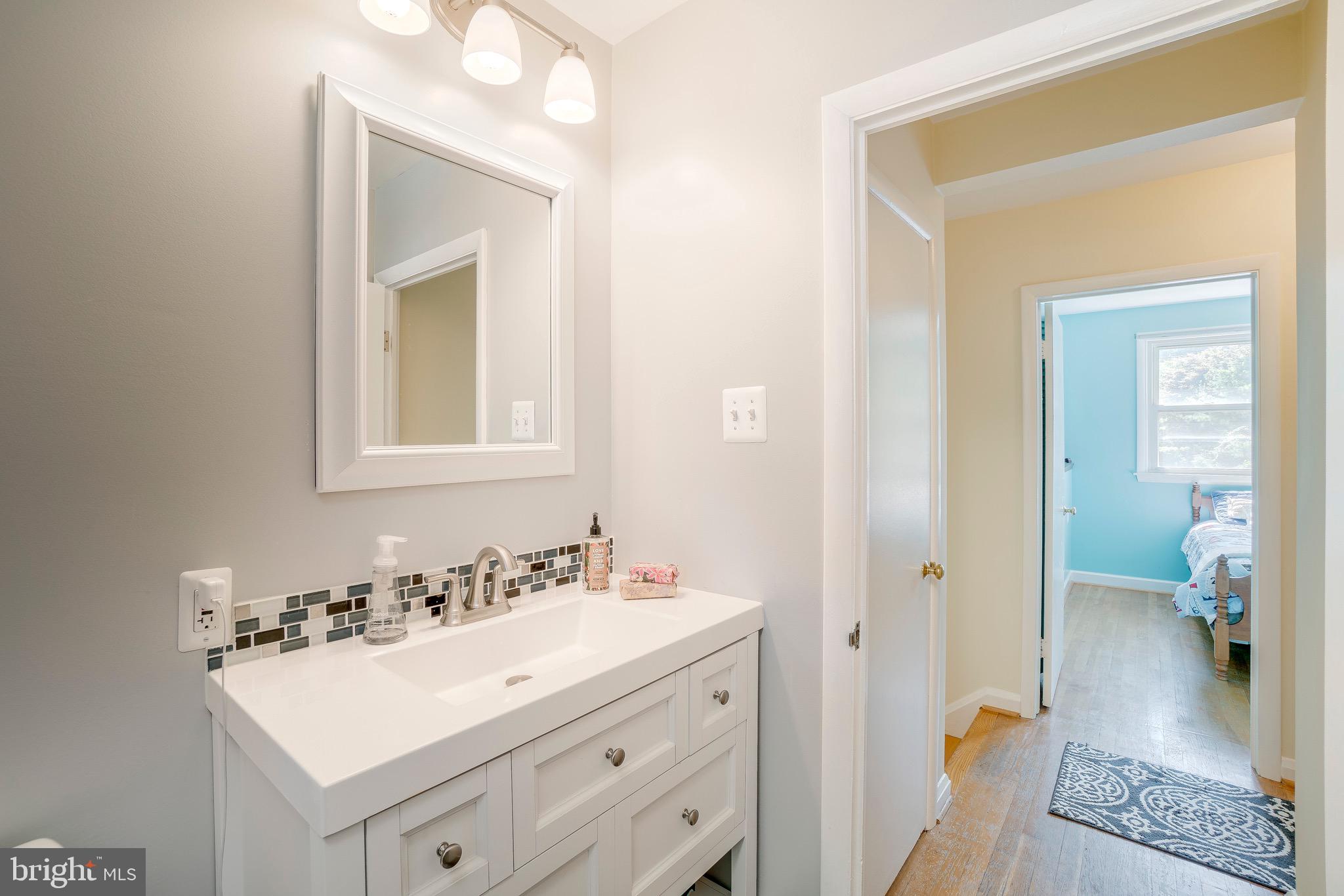 200 Rollingdale Road Baltimore, MD 21228 - Photo 36 of 58 Amazing Totally NEW bath - vanity, tile fixtures