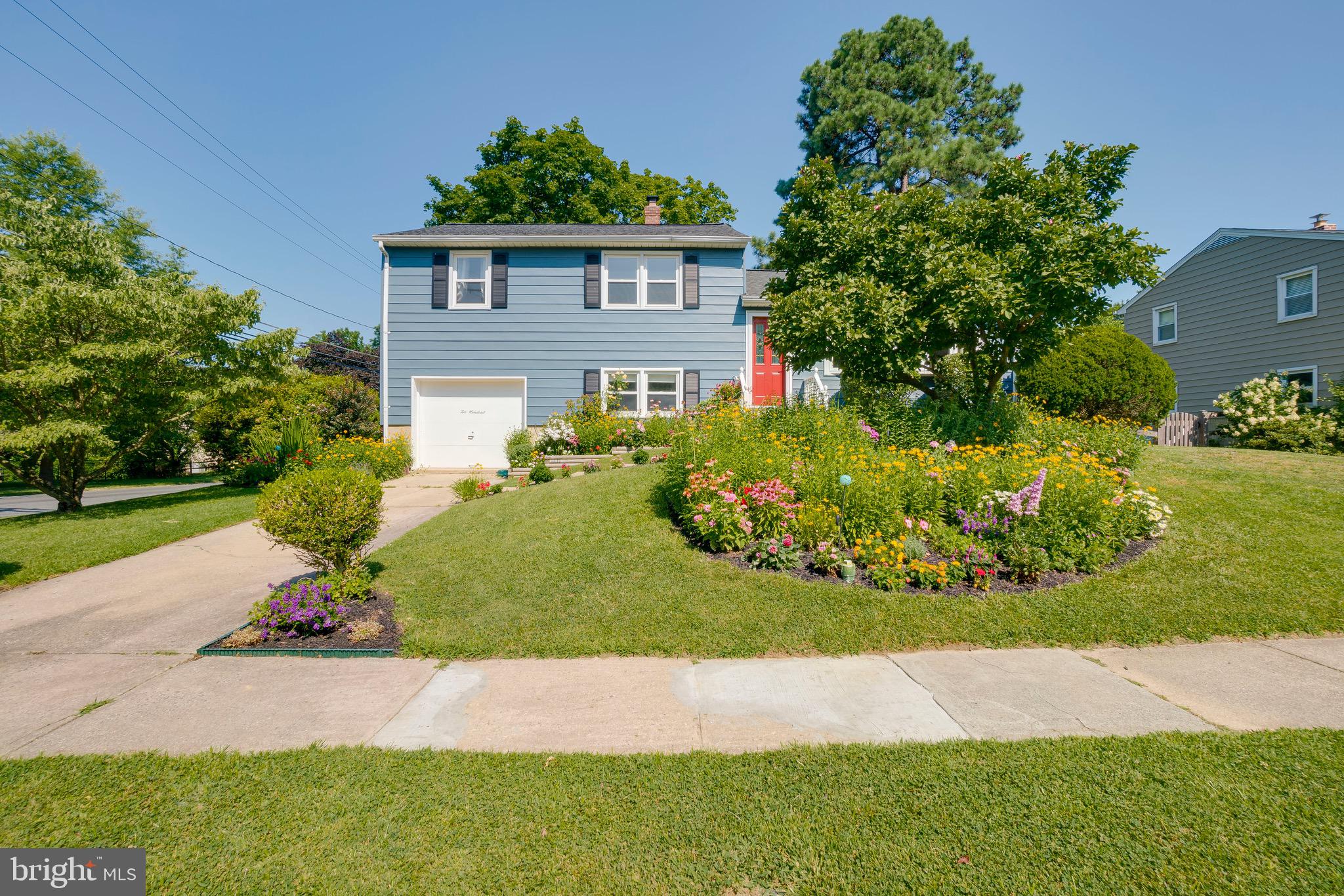 200 Rollingdale Road Baltimore, MD 21228 - Photo 6 of 58 Well cared for landscaping with many annuals