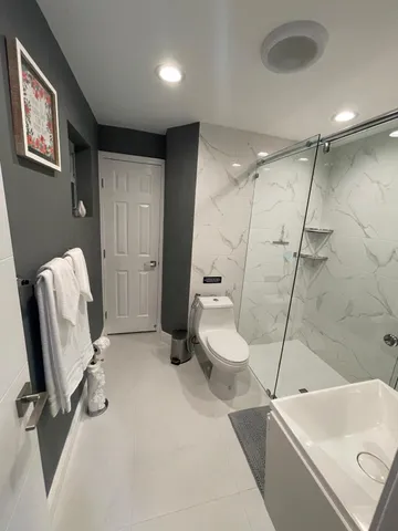 a bathroom with a sink and a toilet