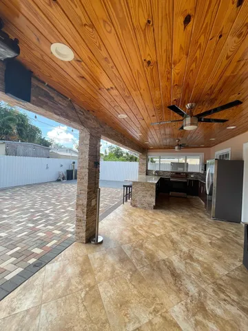 a view of an outdoor space and kitchen