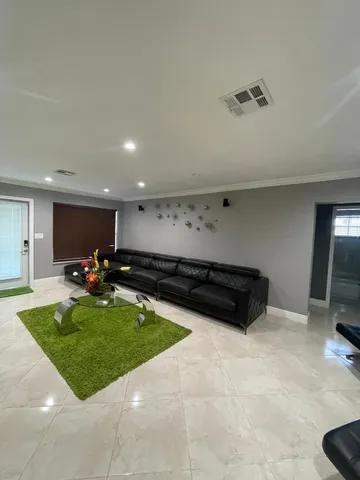 a view of kitchen with a sink and a stove