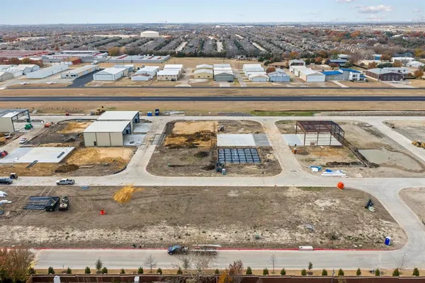 an aerial view of a building with outdoor space