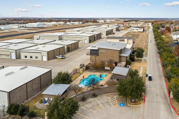 an aerial view of a house with a outdoor space
