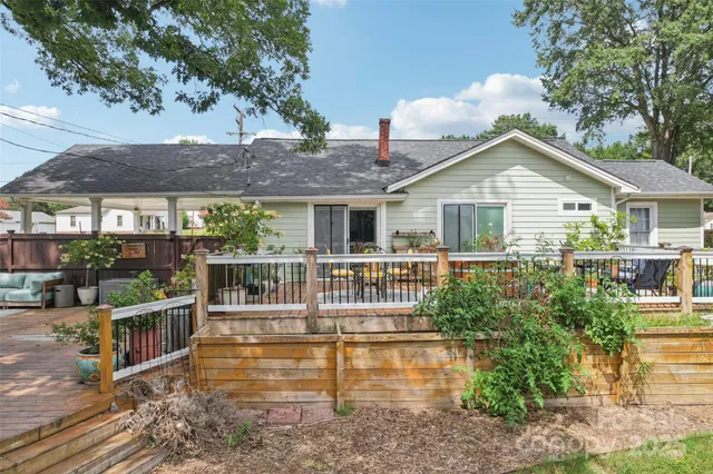 a view of a house with roof deck