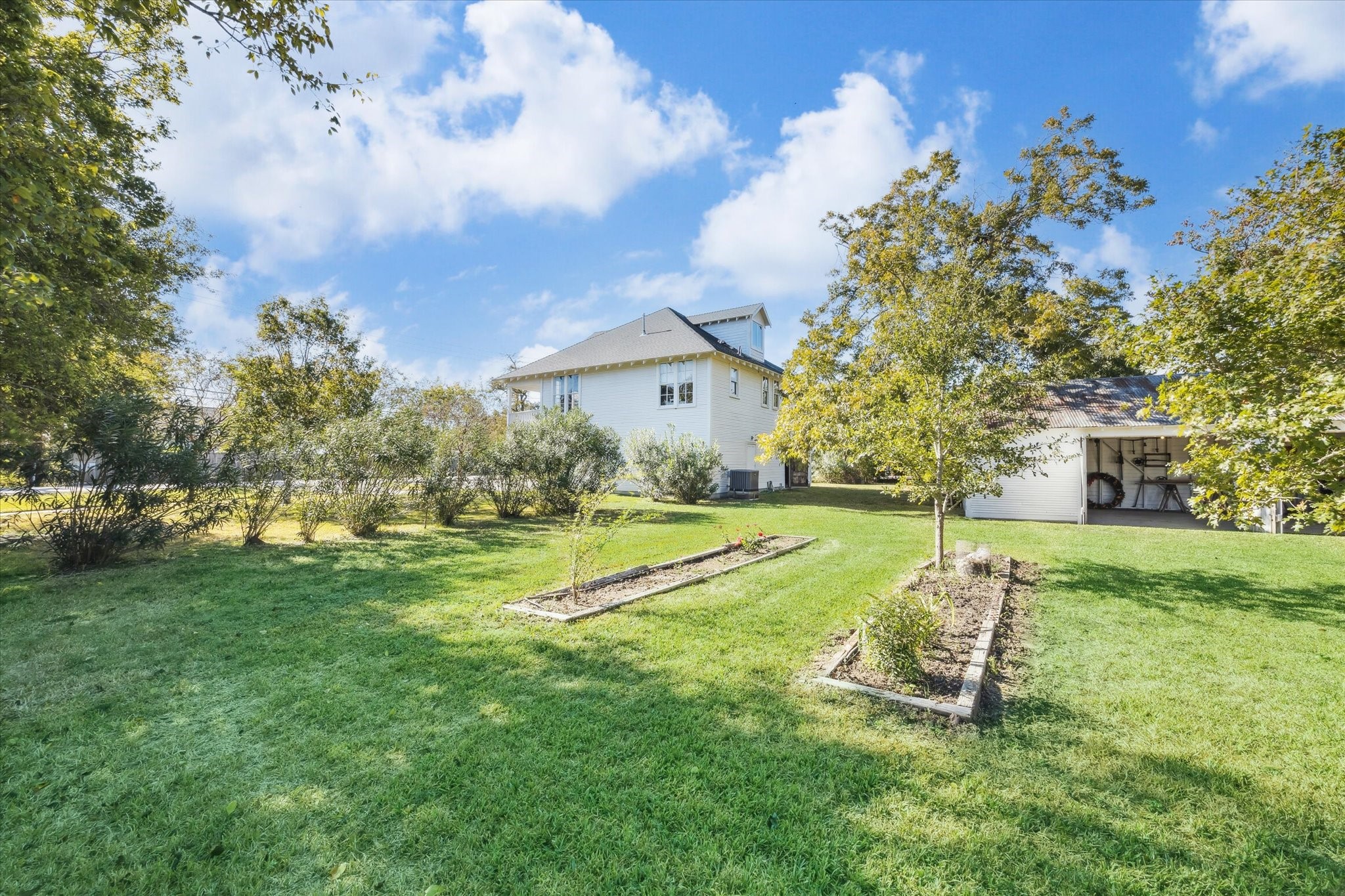 618 Bayridge Road La Porte, TX 77571 - Photo 27 of 40 THE 1.7 ACRE LOT IS GREAT FOR A GARDEN AND FEATURES WATER FAUCETS LINING THE PERIMETER OF THE PROPERTY.