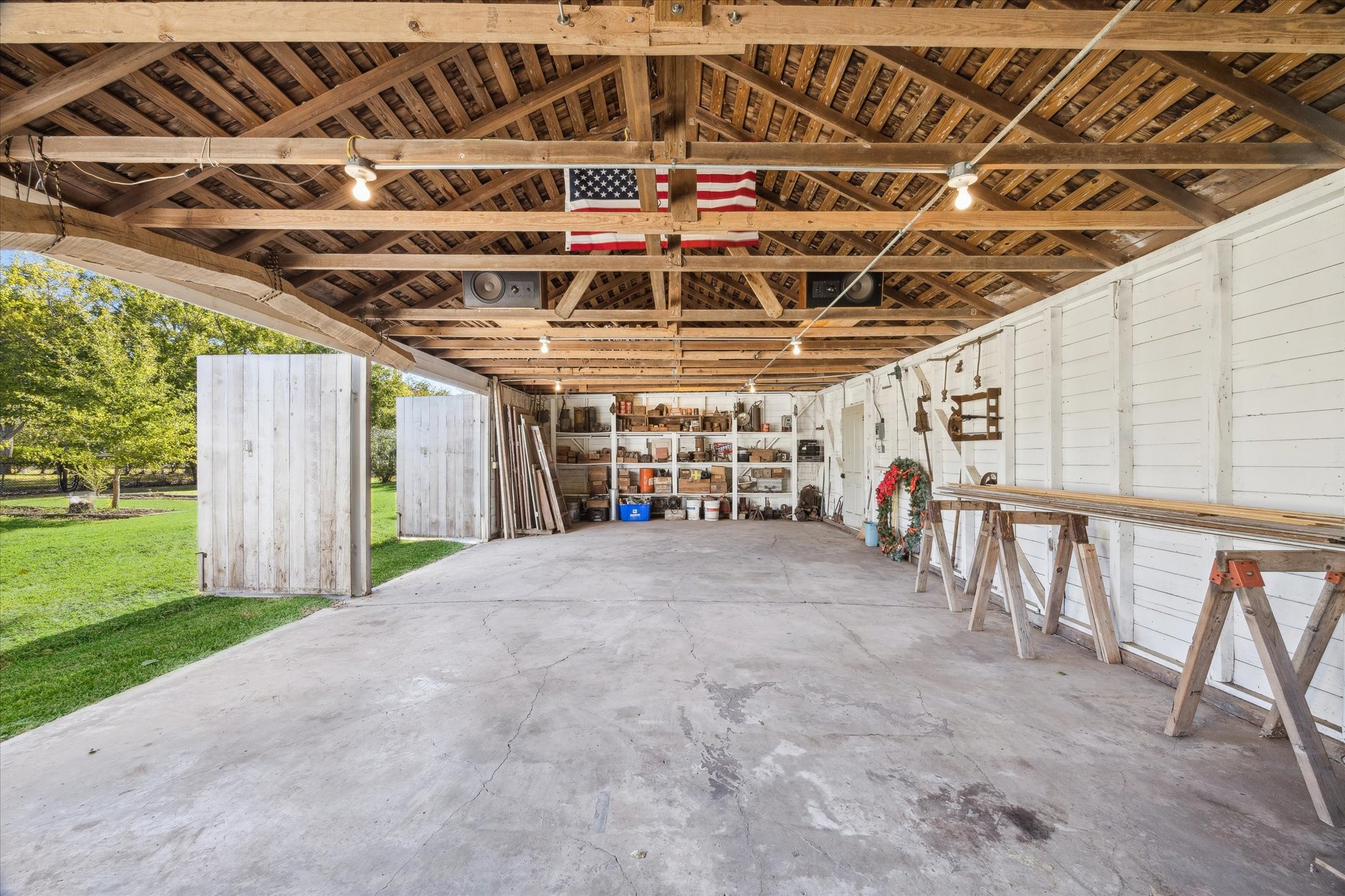 618 Bayridge Road La Porte, TX 77571 - Photo 29 of 40 VIEW OF THE DETACHED GARAGE/BARN WITH PARKING FOR 3 VEHICLES. THE BACK OFFERS A LARGE WORKSHOP AREA AS WELL.