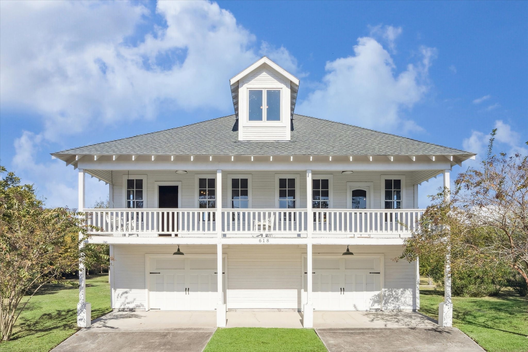 618 Bayridge Road La Porte, TX 77571 - Photo 8 of 40 THIS IS THE ORIGINAL CARRIAGE HOUSE FROM 1933 WHICH HAS BEEN RAISED, NOW OFFERING GREAT ELEVATION AND ATTACHED GARAGE PARKING.