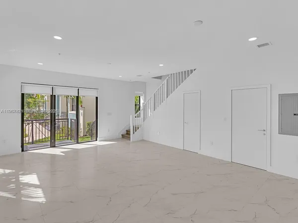 a view of an empty room with window