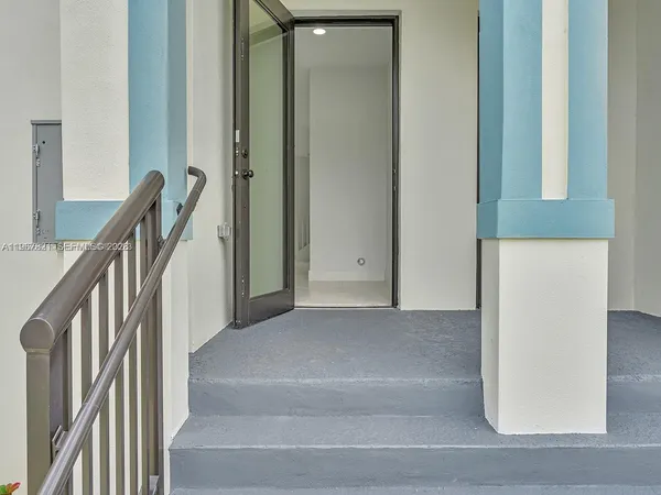 a view of staircase with wooden floor and stairs