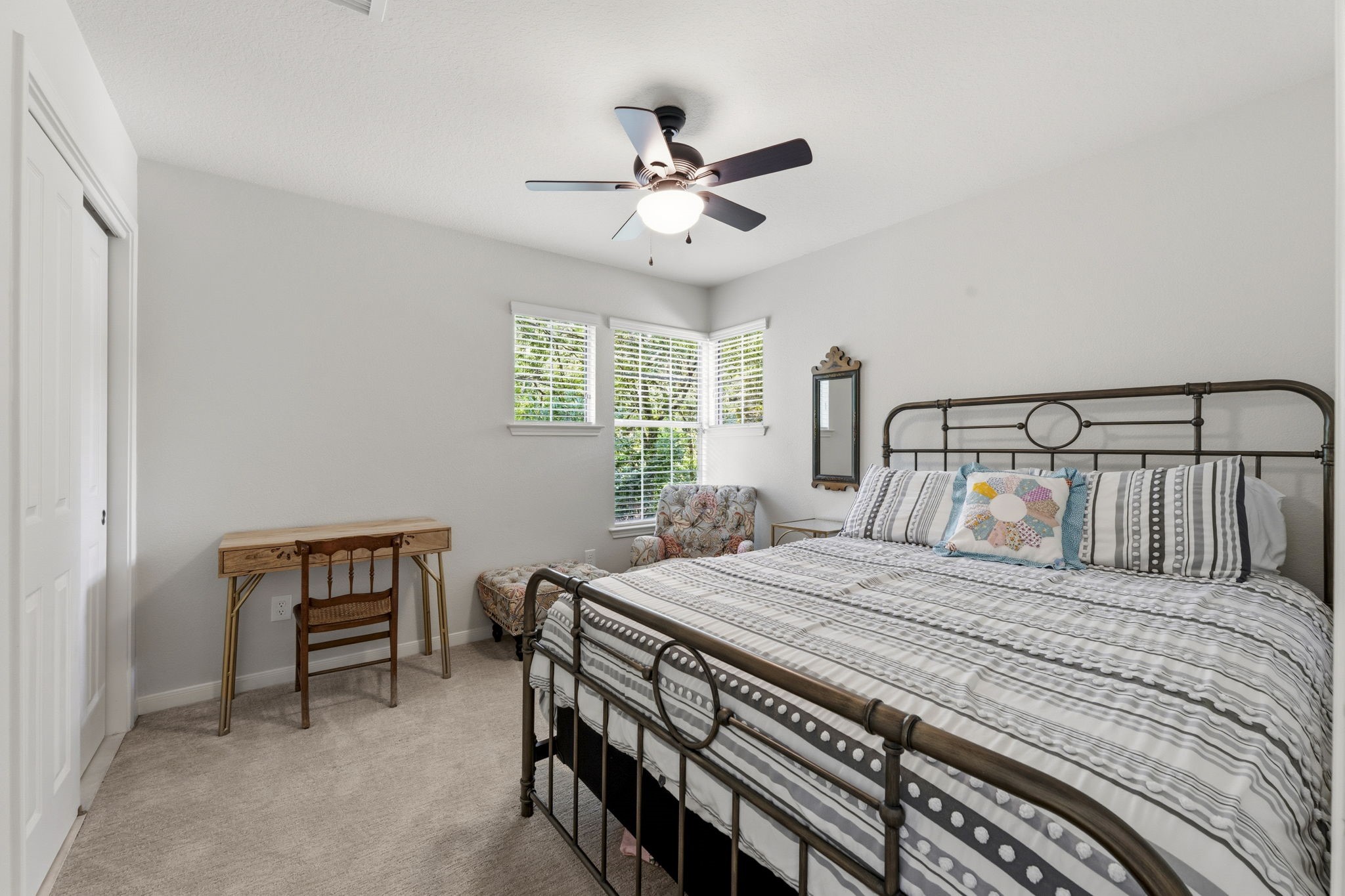6 North Flickering Sun Circle Spring, TX 77382 - Photo 23 of 33 Secondary bedroom holds a kingsize bed.
