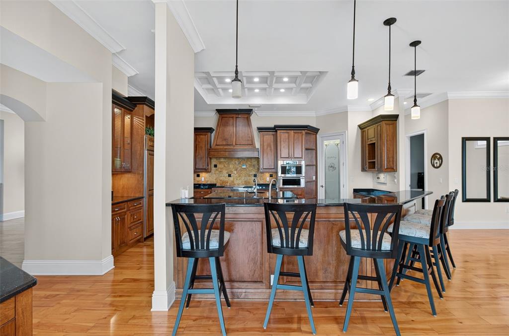 7986 9th Avenue South St. Petersburg, FL 33707 - Photo 12 of 83 a view of a dining room with furniture and chandelier