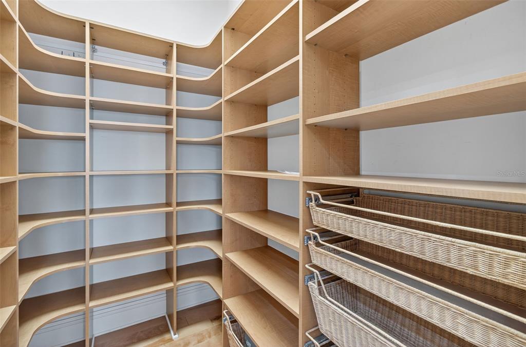 7986 9th Avenue South St. Petersburg, FL 33707 - Photo 15 of 83 a view of walk in closet with empty racks