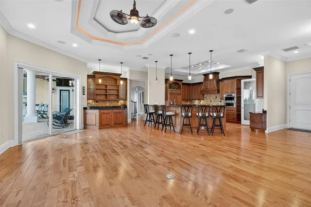 a bathroom with a granite countertop sink mirror and