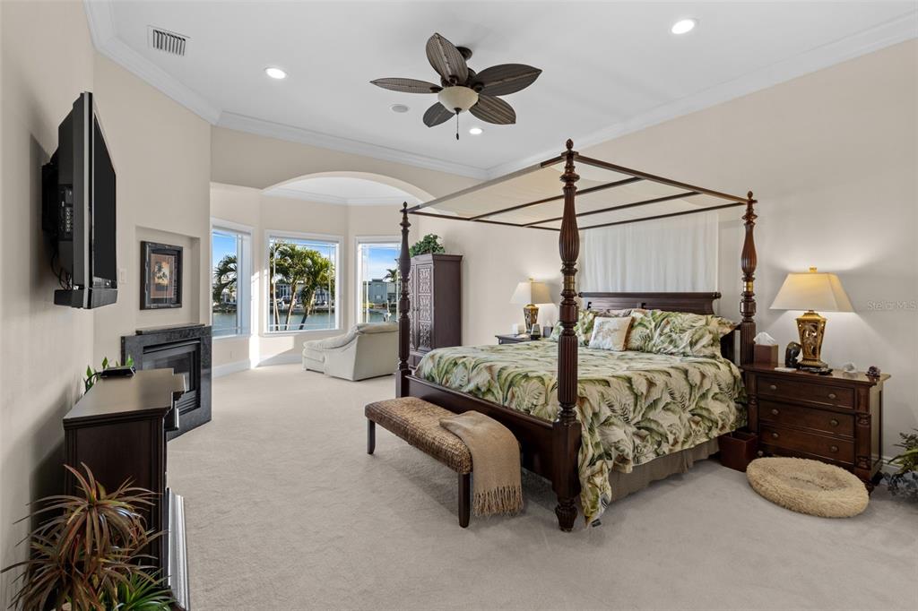 7986 9th Avenue South St. Petersburg, FL 33707 - Photo 20 of 83 a bedroom with a bed couch and window