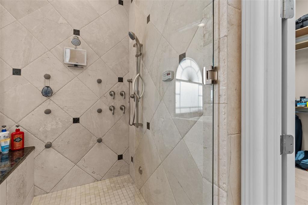 7986 9th Avenue South St. Petersburg, FL 33707 - Photo 28 of 83 a bathroom with a sink vanity and mirror