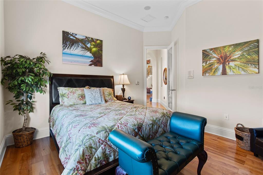 7986 9th Avenue South St. Petersburg, FL 33707 - Photo 32 of 83 a bedroom with a bed and wooden floor