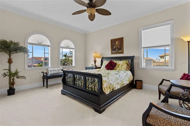 a view of a chairs and table in patio with wooden floor