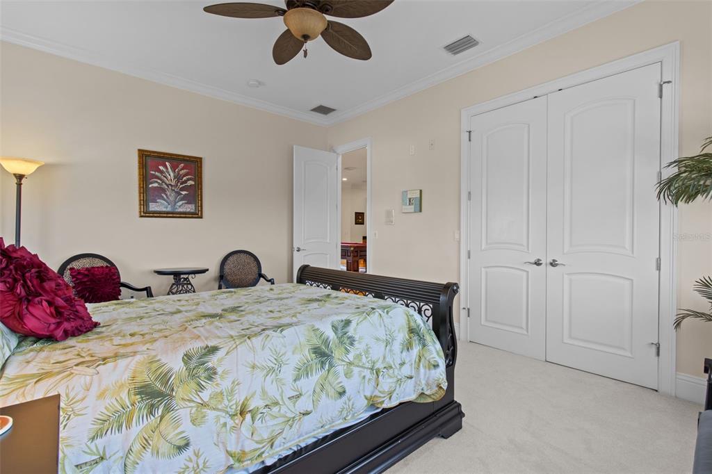 7986 9th Avenue South St. Petersburg, FL 33707 - Photo 43 of 83 a bedroom with a bed and cabinets