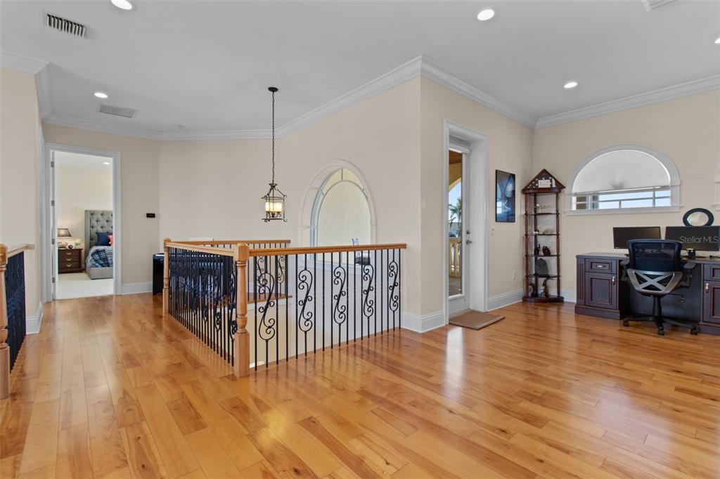 7986 9th Avenue South St. Petersburg, FL 33707 - Photo 46 of 83 a view of a livingroom with furniture hardwood floor and a ceiling fan