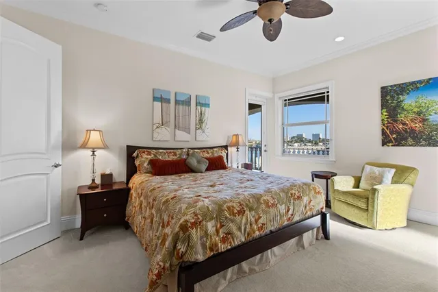 a front view of a house with a yard porch and outdoor seating