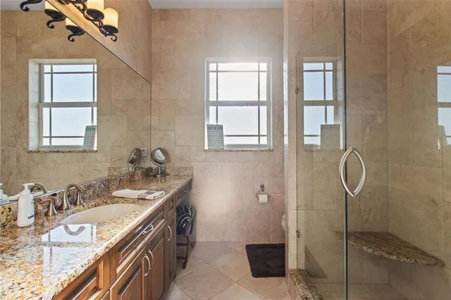 a view of a swimming pool with a deck