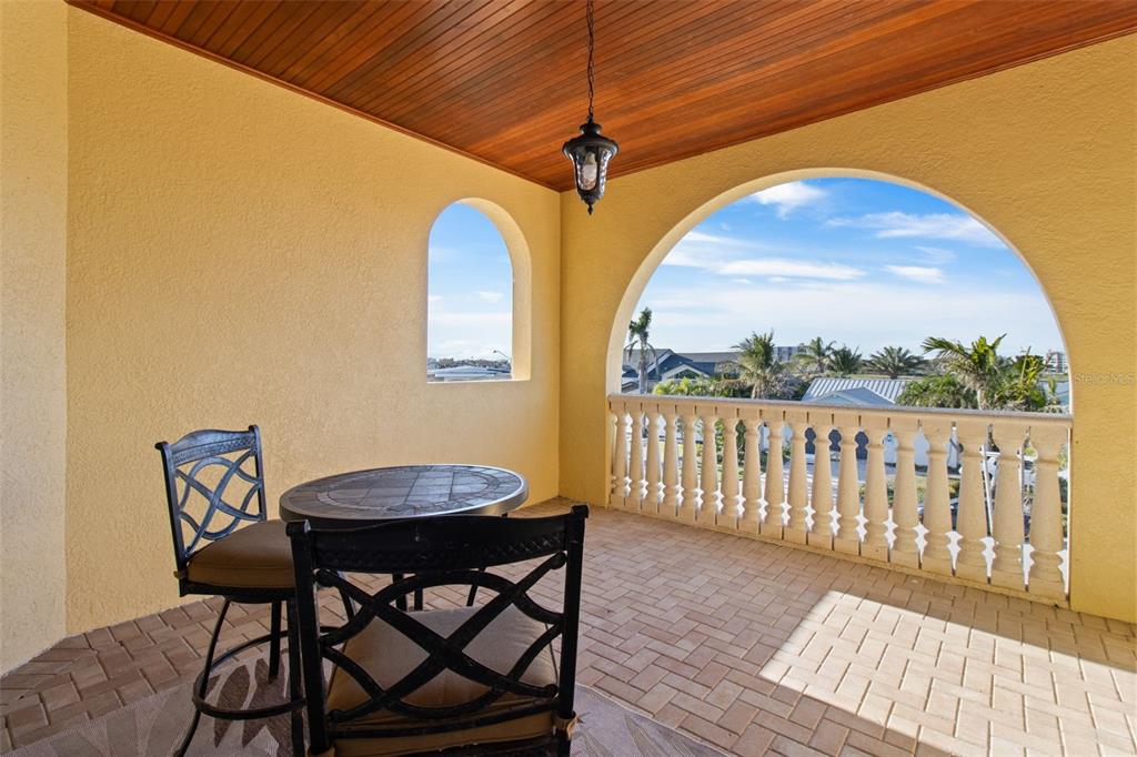 7986 9th Avenue South St. Petersburg, FL 33707 - Photo 57 of 83 a view of a chairs and table in the balcony