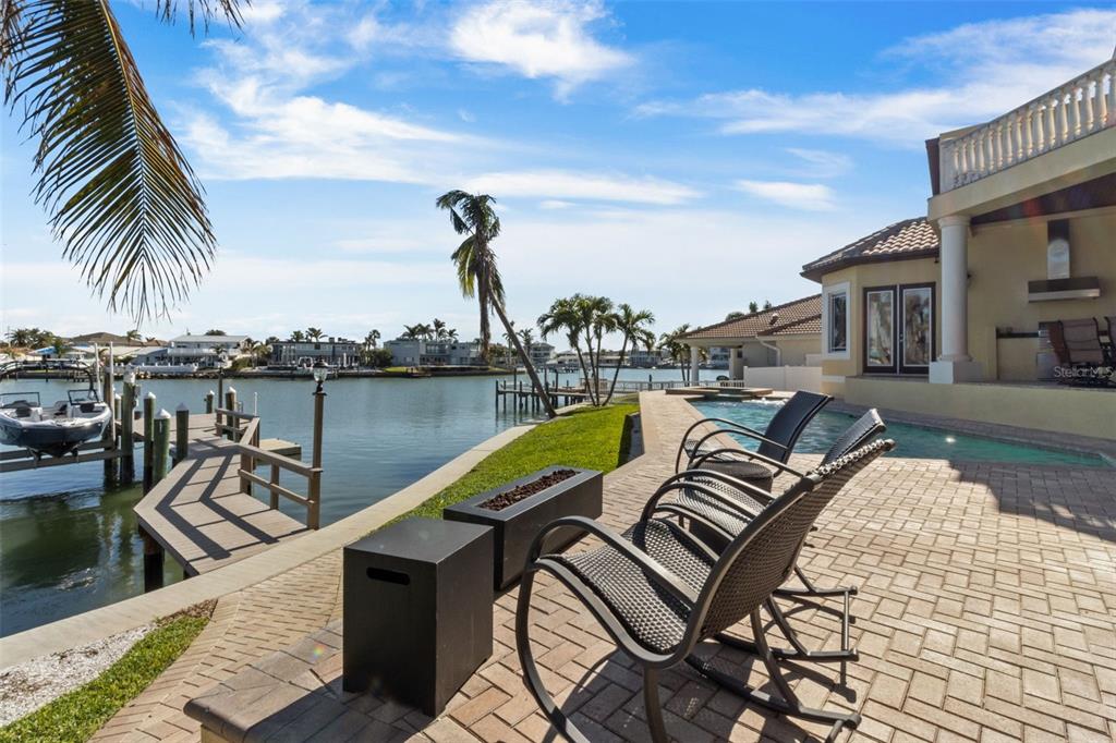 7986 9th Avenue South St. Petersburg, FL 33707 - Photo 69 of 83 a view of a swimming pool with a deck