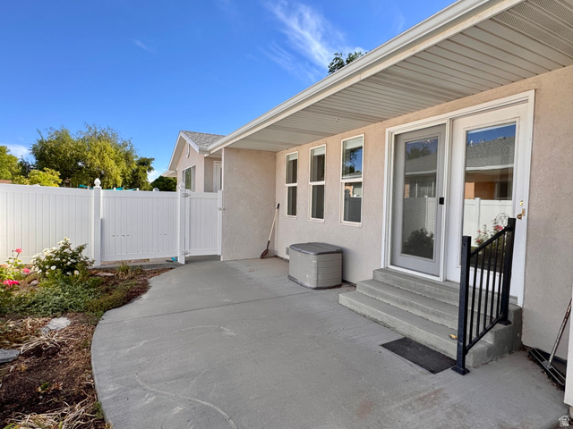 461 Topaz Boulevard, Unit 6 Delta, UT 84624 - Photo 37 of 45 Patio & garden with privacy fence in back yard