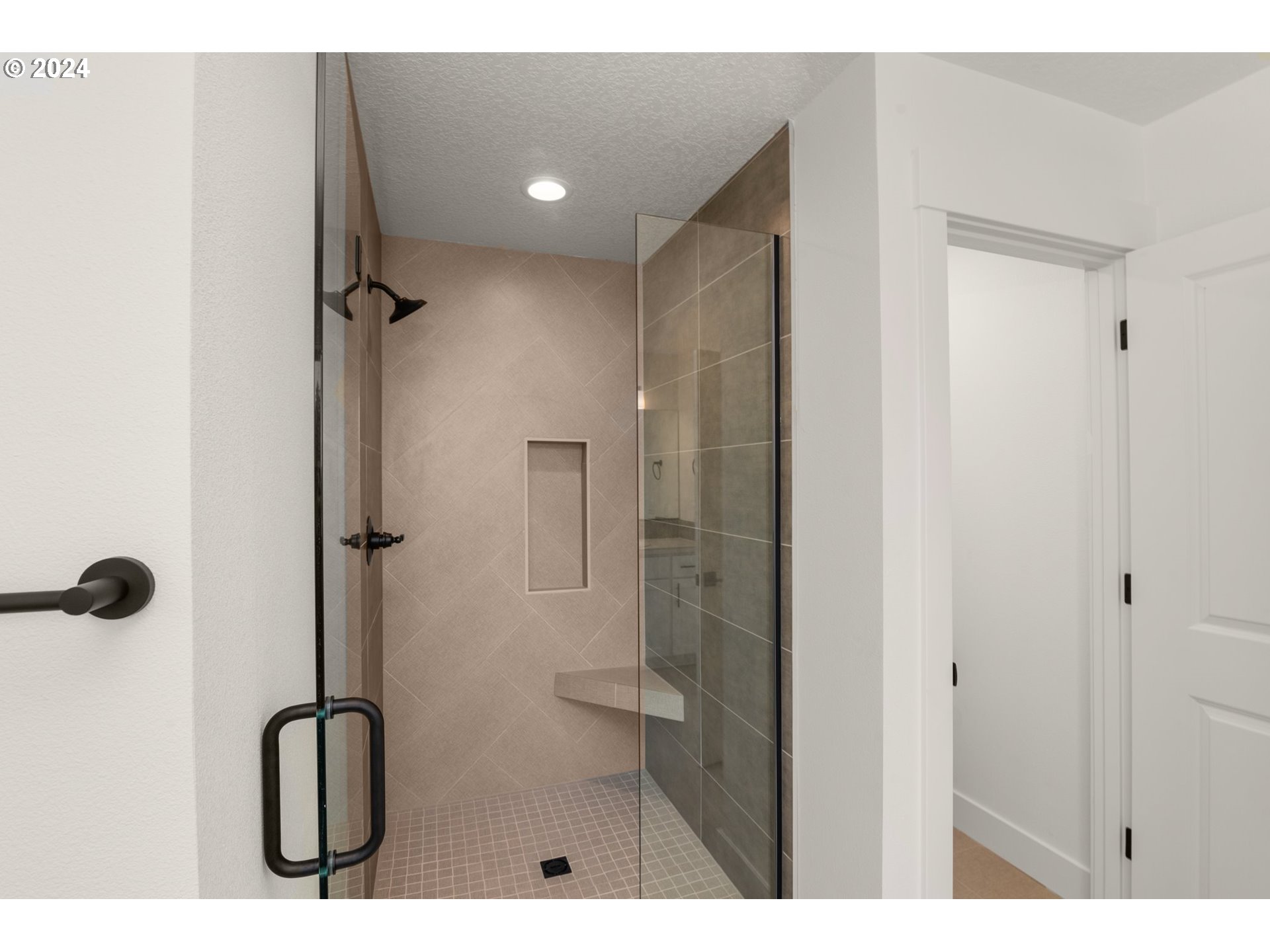 7939 Southwest 176th Terrace, Unit LOT1 Beaverton, OR 97007 - Photo 14 of 25 a bathroom with a granite countertop shower
