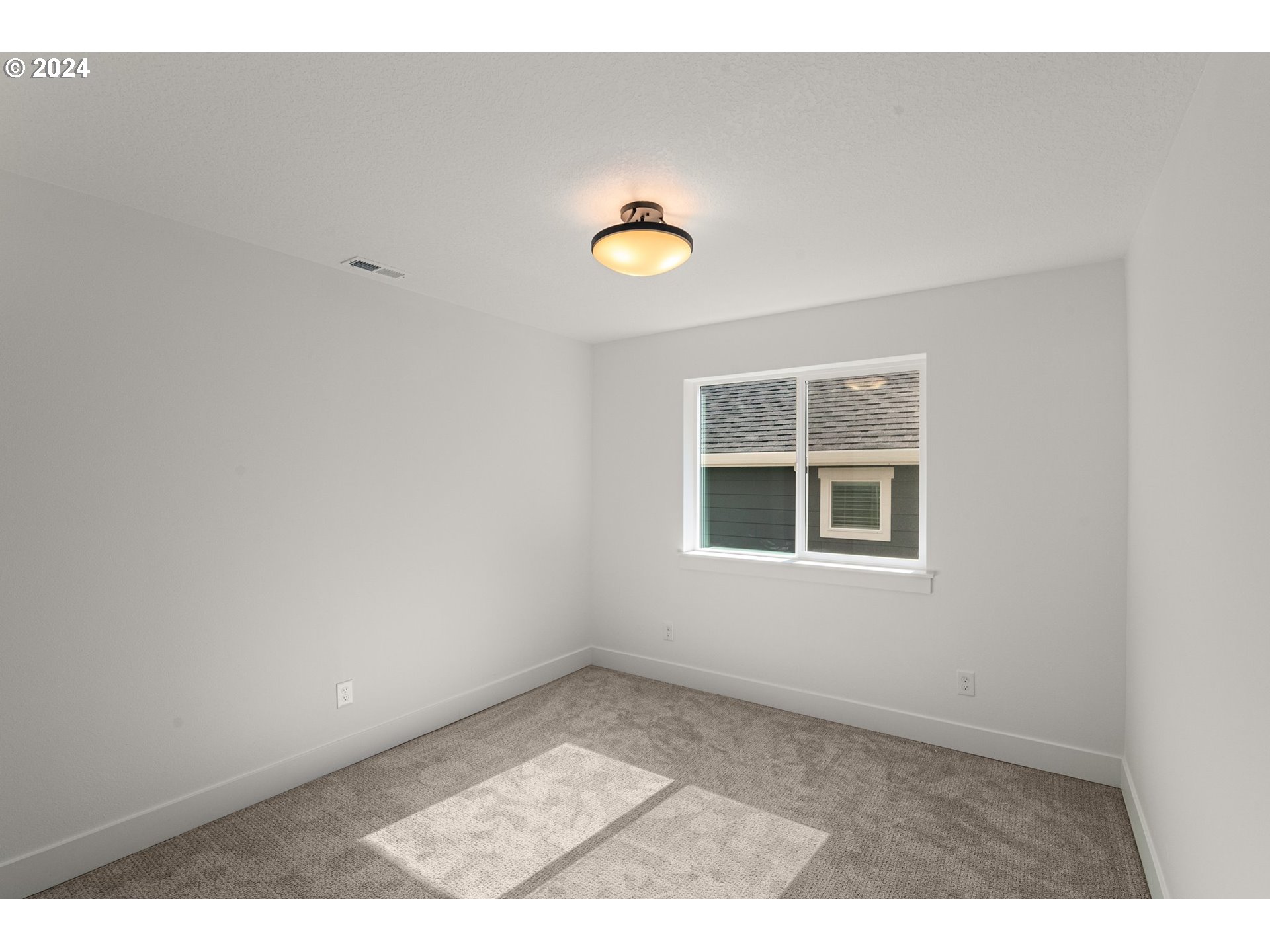 7939 Southwest 176th Terrace, Unit LOT1 Beaverton, OR 97007 - Photo 17 of 25 a view of a room