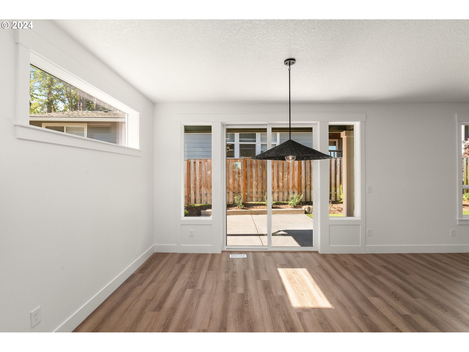 7939 Southwest 176th Terrace, Unit LOT1 Beaverton, OR 97007 - Photo 9 of 25 a view interior of house with wooden floor