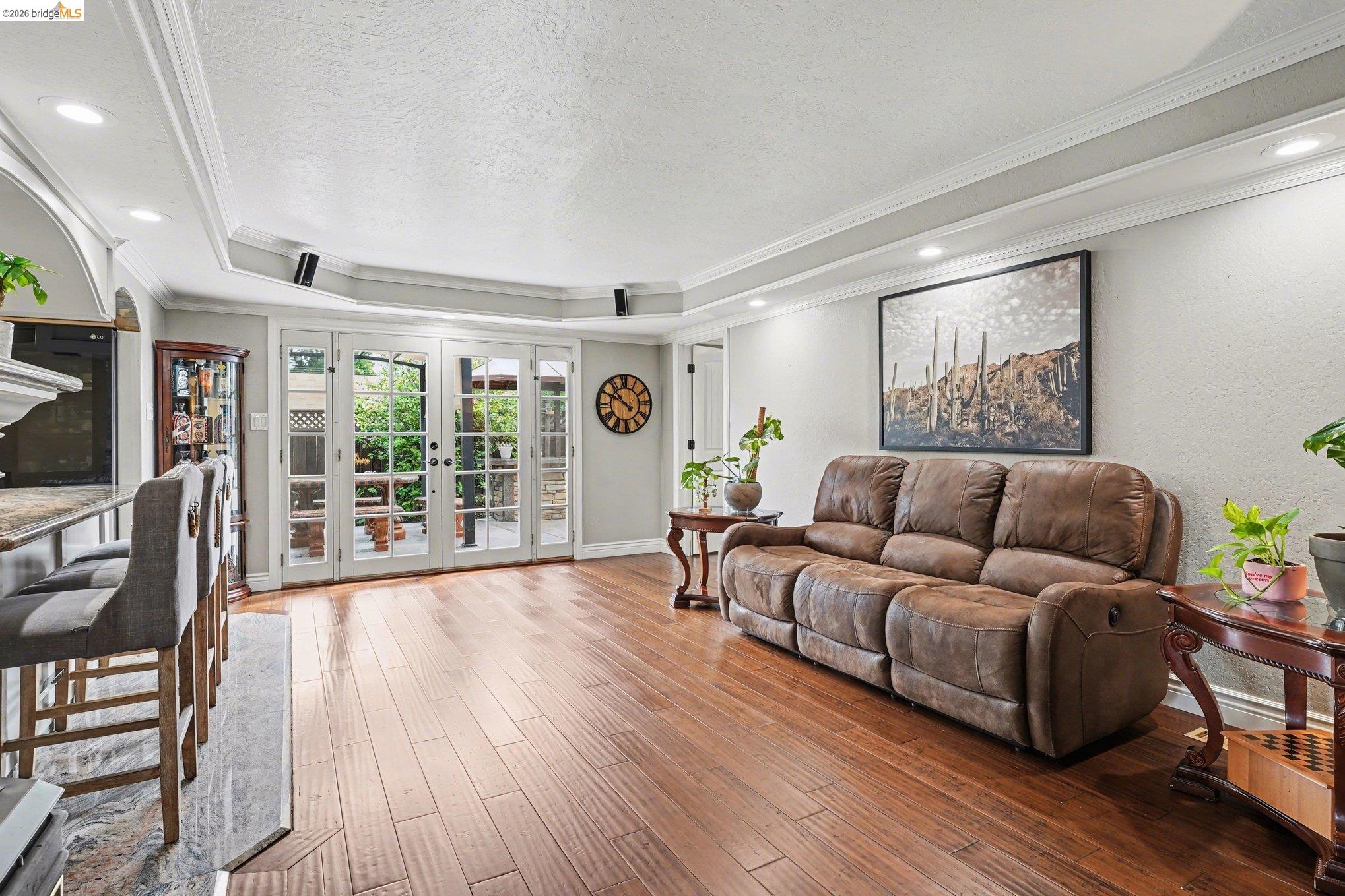 3614 Kay Court Fremont, CA 94538 - Photo 13 of 37 a living room with furniture and a wooden floor
