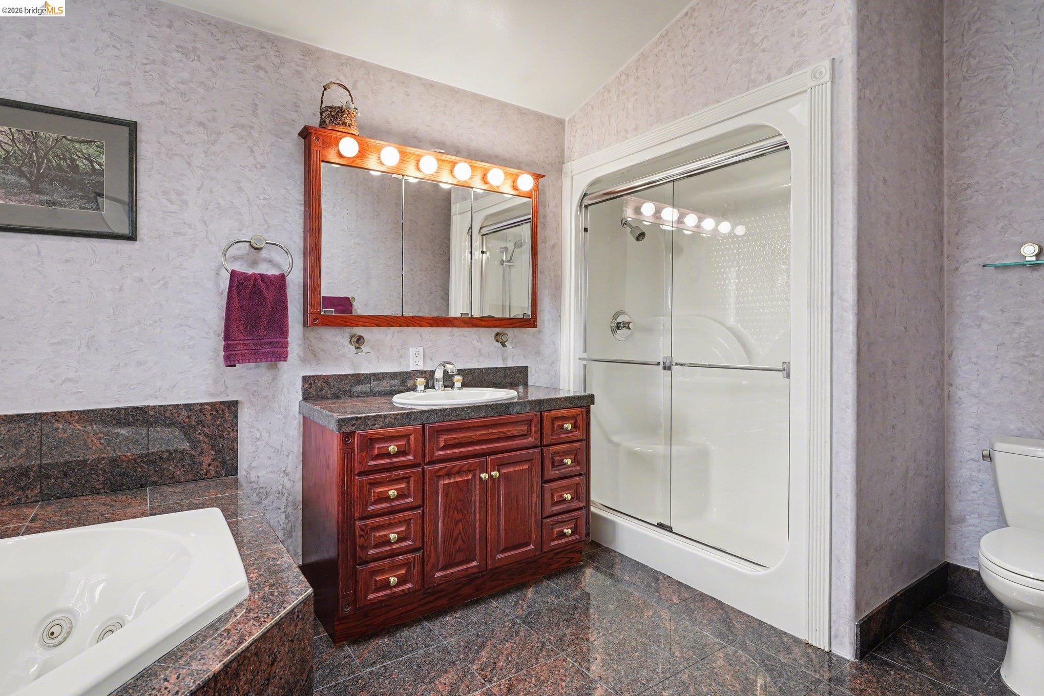 3614 Kay Court Fremont, CA 94538 - Photo 17 of 37 a spacious bathroom with a tub sink and mirror
