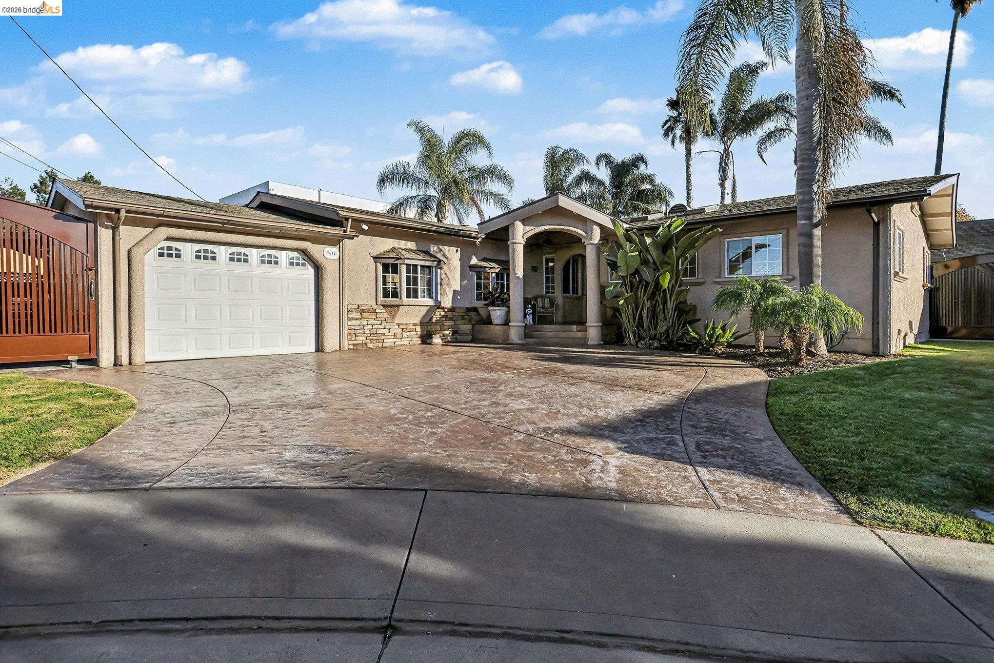 3614 Kay Court Fremont, CA 94538 - Photo 2 of 37 a front view of a house with a yard