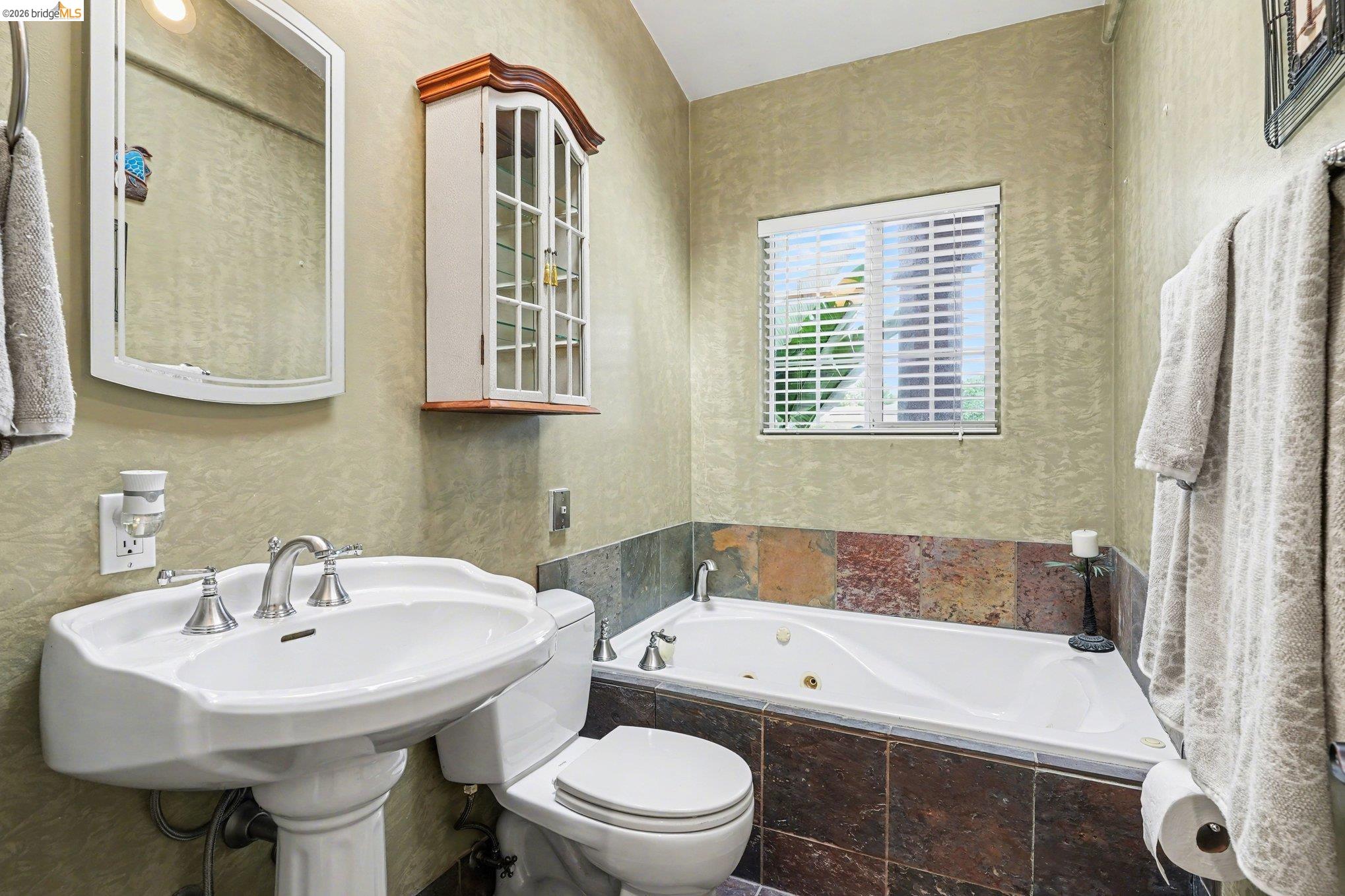 3614 Kay Court Fremont, CA 94538 - Photo 24 of 37 a bathroom with a sink a toilet and a bathtub