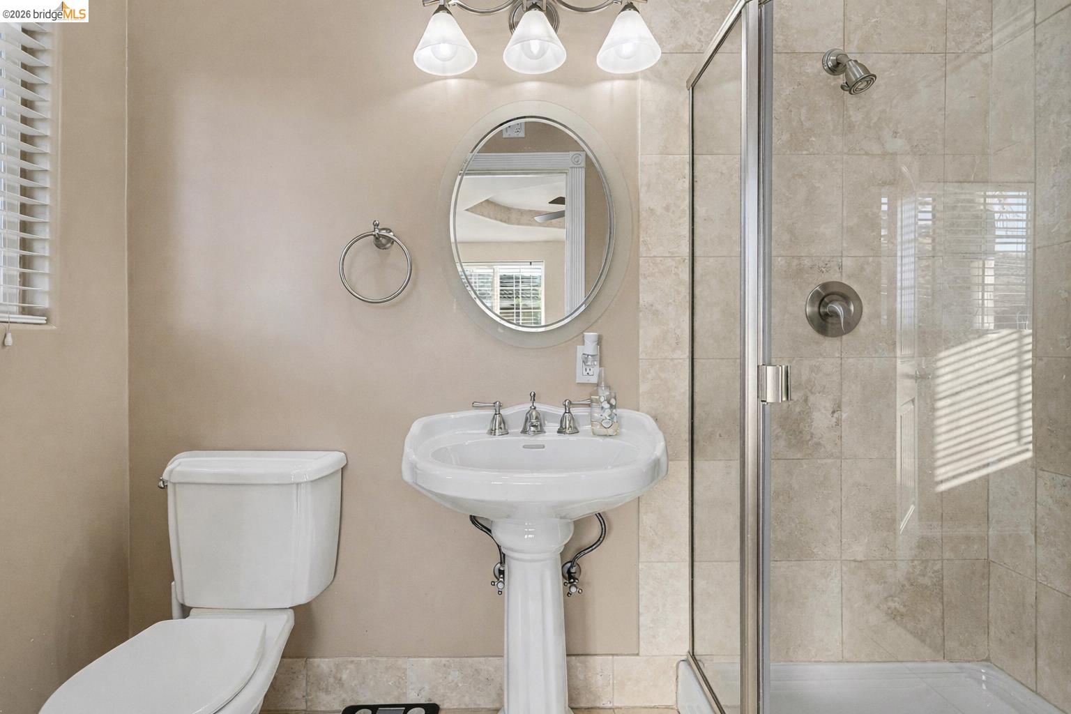 3614 Kay Court Fremont, CA 94538 - Photo 28 of 37 a bathroom with a toilet sink and mirror