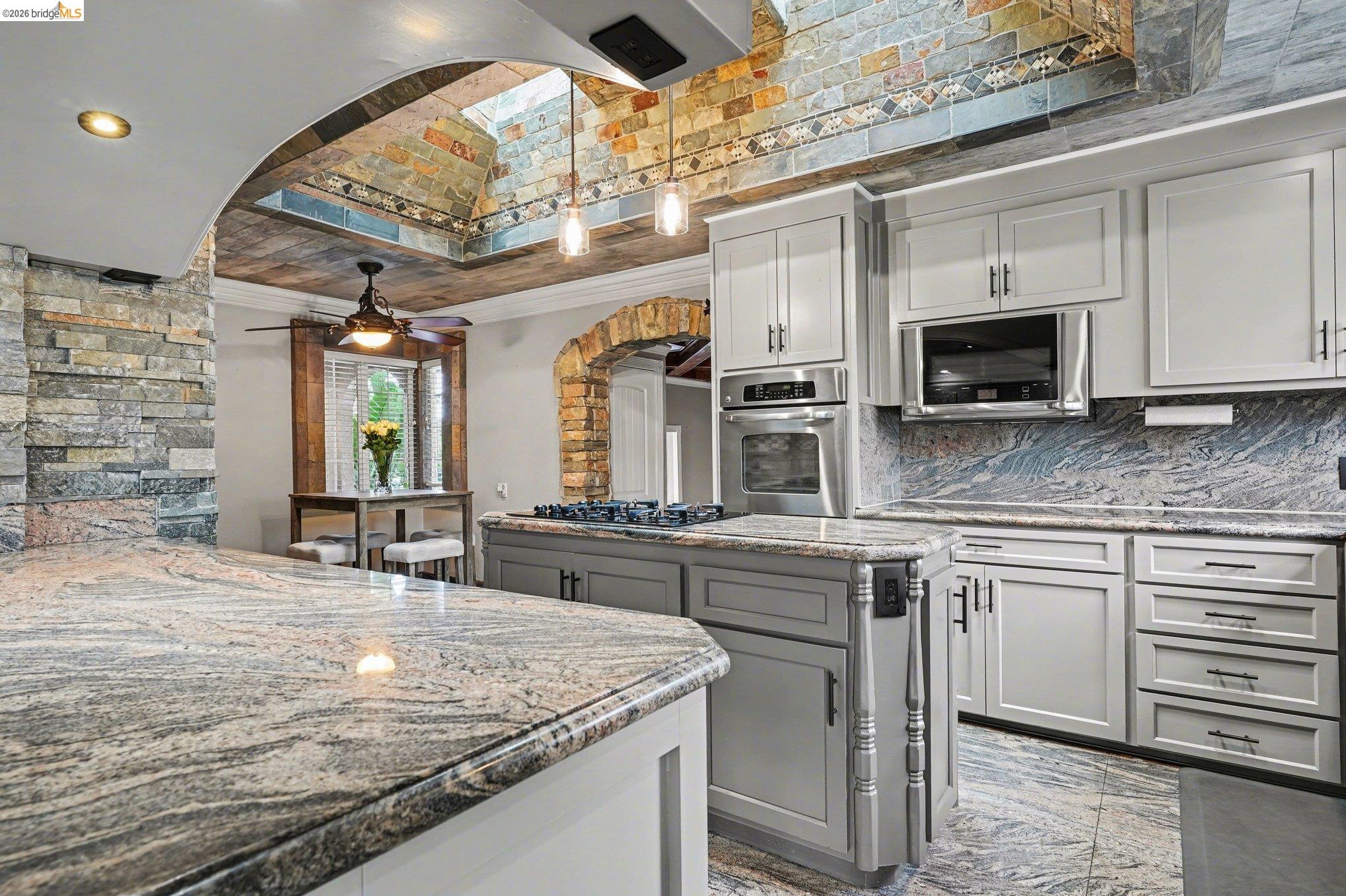 3614 Kay Court Fremont, CA 94538 - Photo 7 of 37 a kitchen with stainless steel appliances granite countertop a sink and cabinets