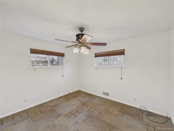 a view of a big room with carpet