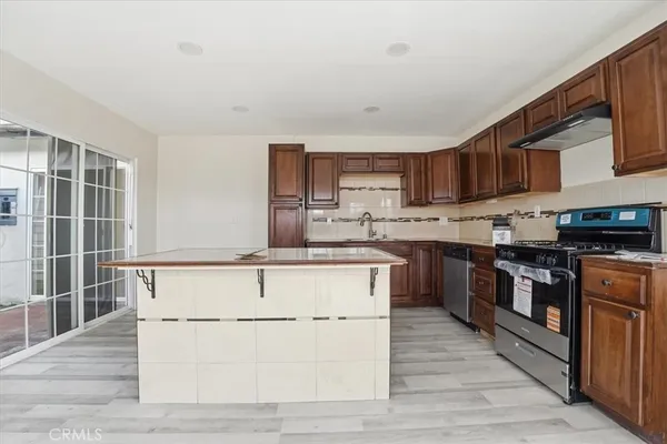 a view of room with wooden floor