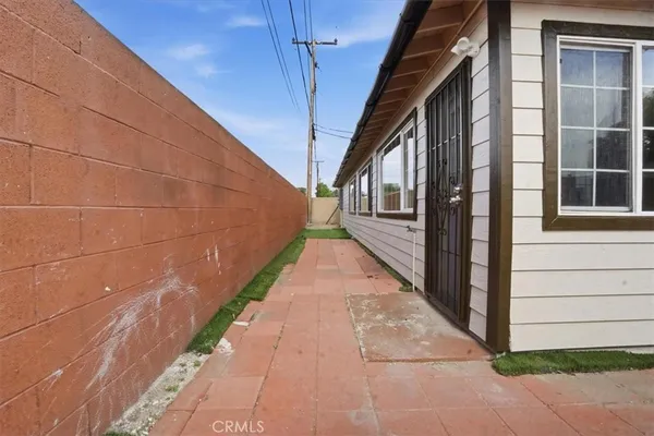 an aerial view of houses with outdoor space