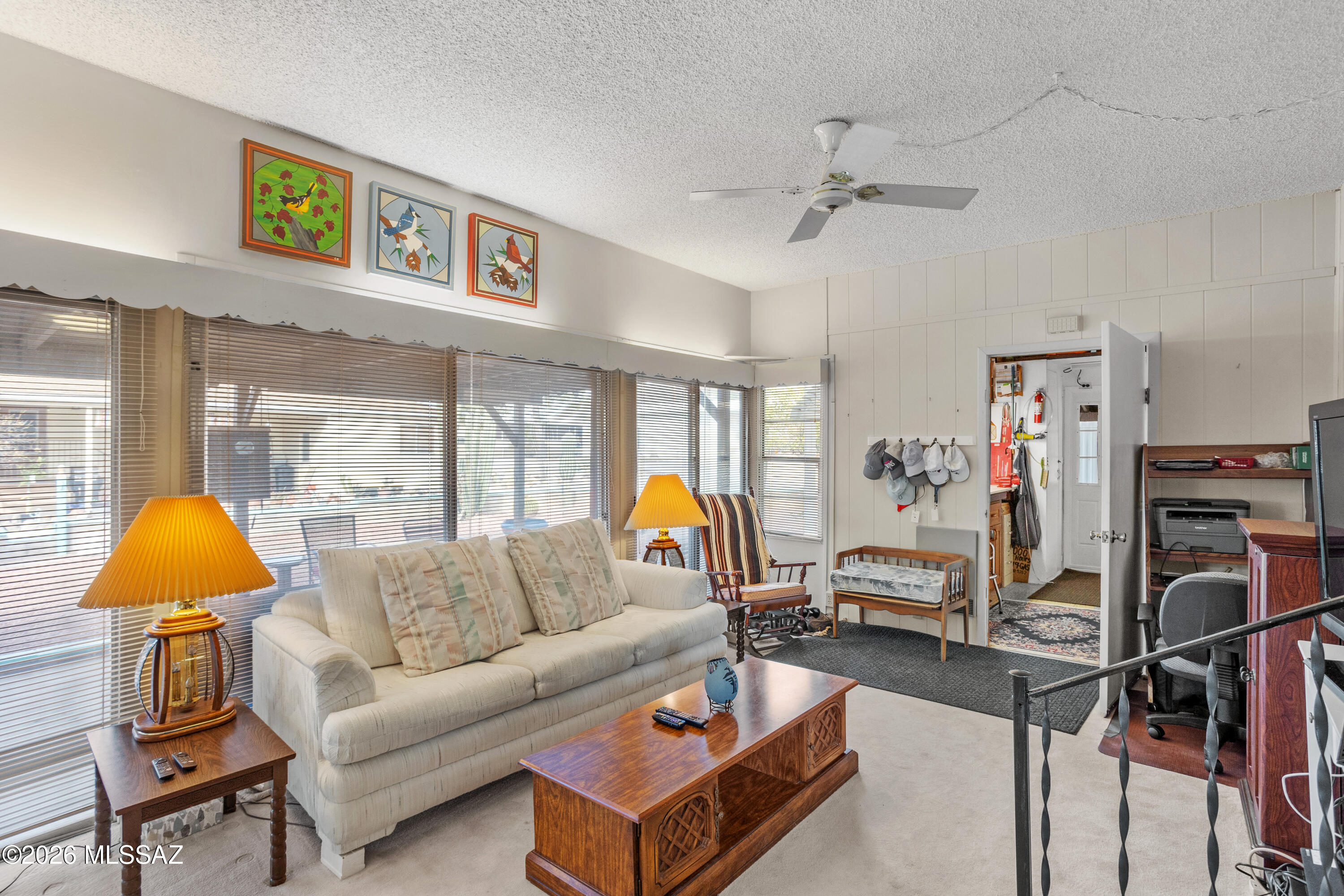 6126 West Rafter Cir Street Tucson, AZ 85713 - Photo 15 of 30 Large room with slider doors + tall ceilings