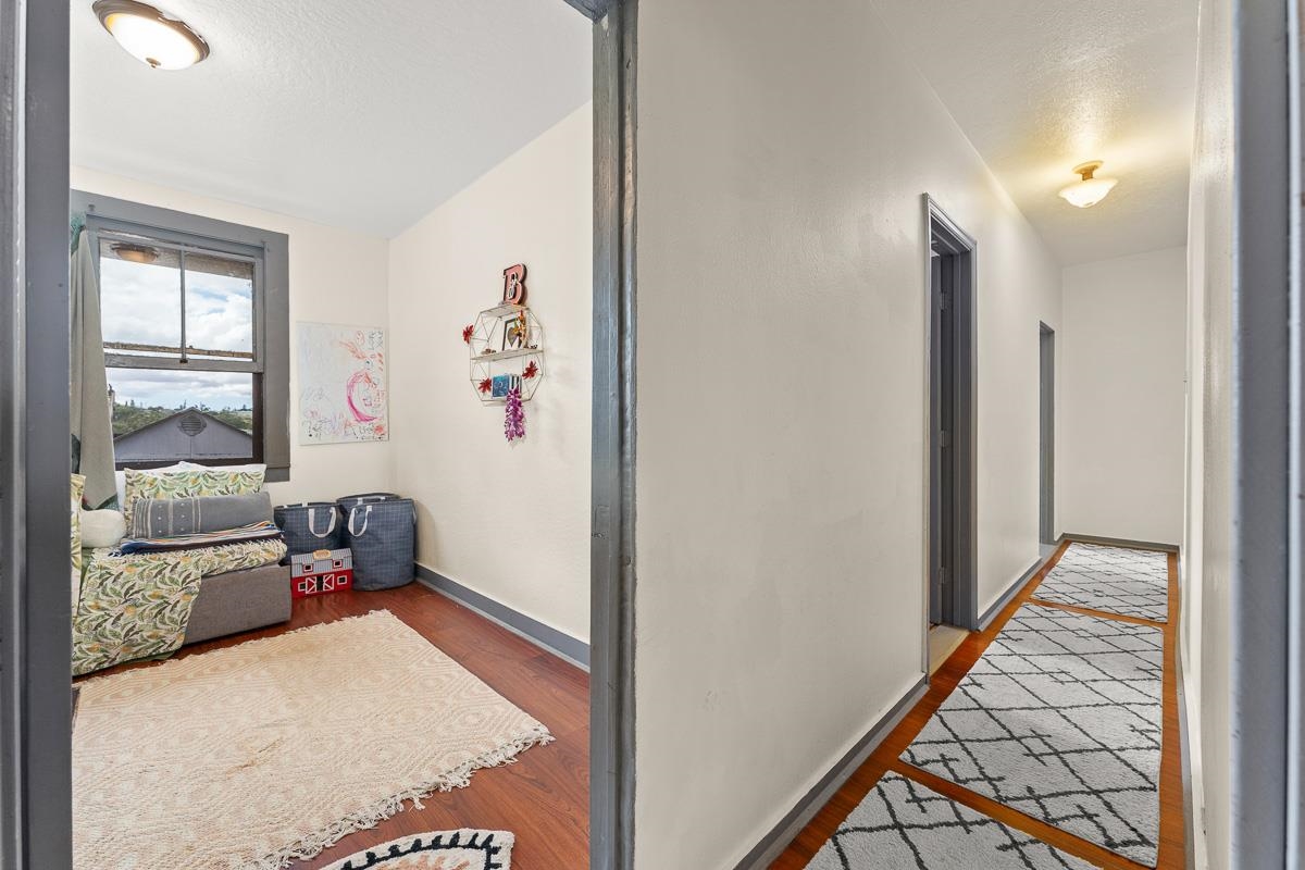 2970 Kailiili Road, Unit 1B Haiku, HI 96708 - Photo 15 of 47 a view of an empty room and bedroom
