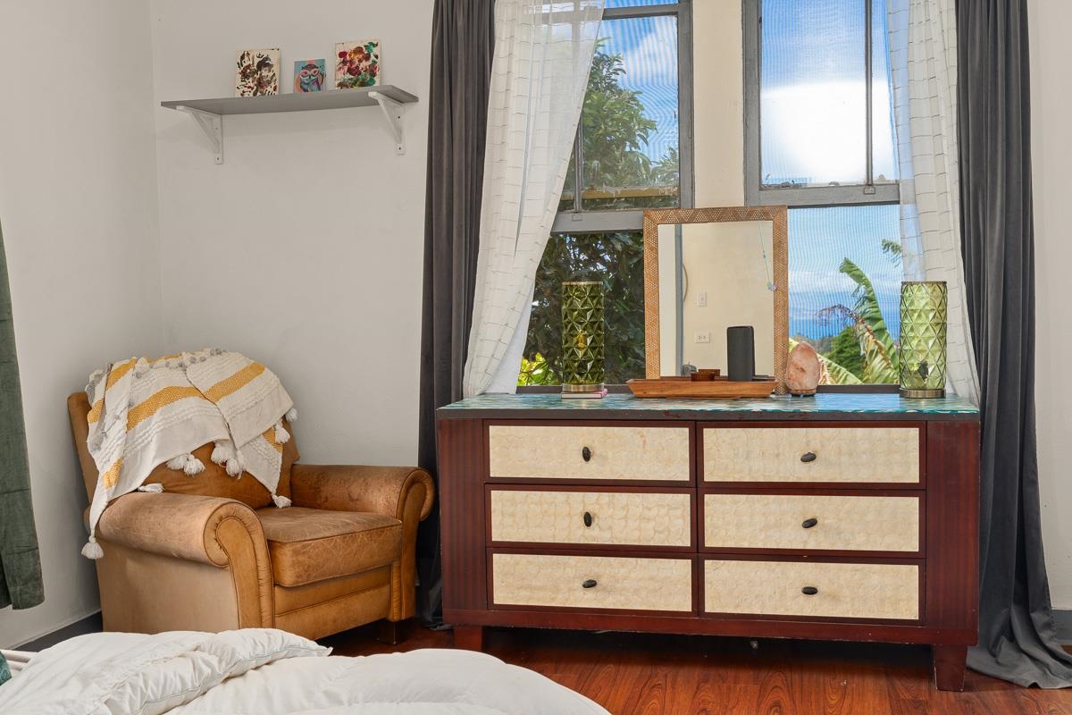 2970 Kailiili Road, Unit 1B Haiku, HI 96708 - Photo 18 of 47 a living room with furniture and a window