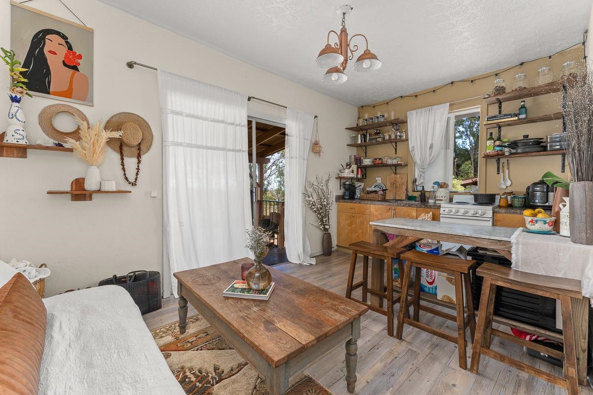 2970 Kailiili Road, Unit 1B Haiku, HI 96708 - Photo 29 of 47 a view of a dining room with furniture