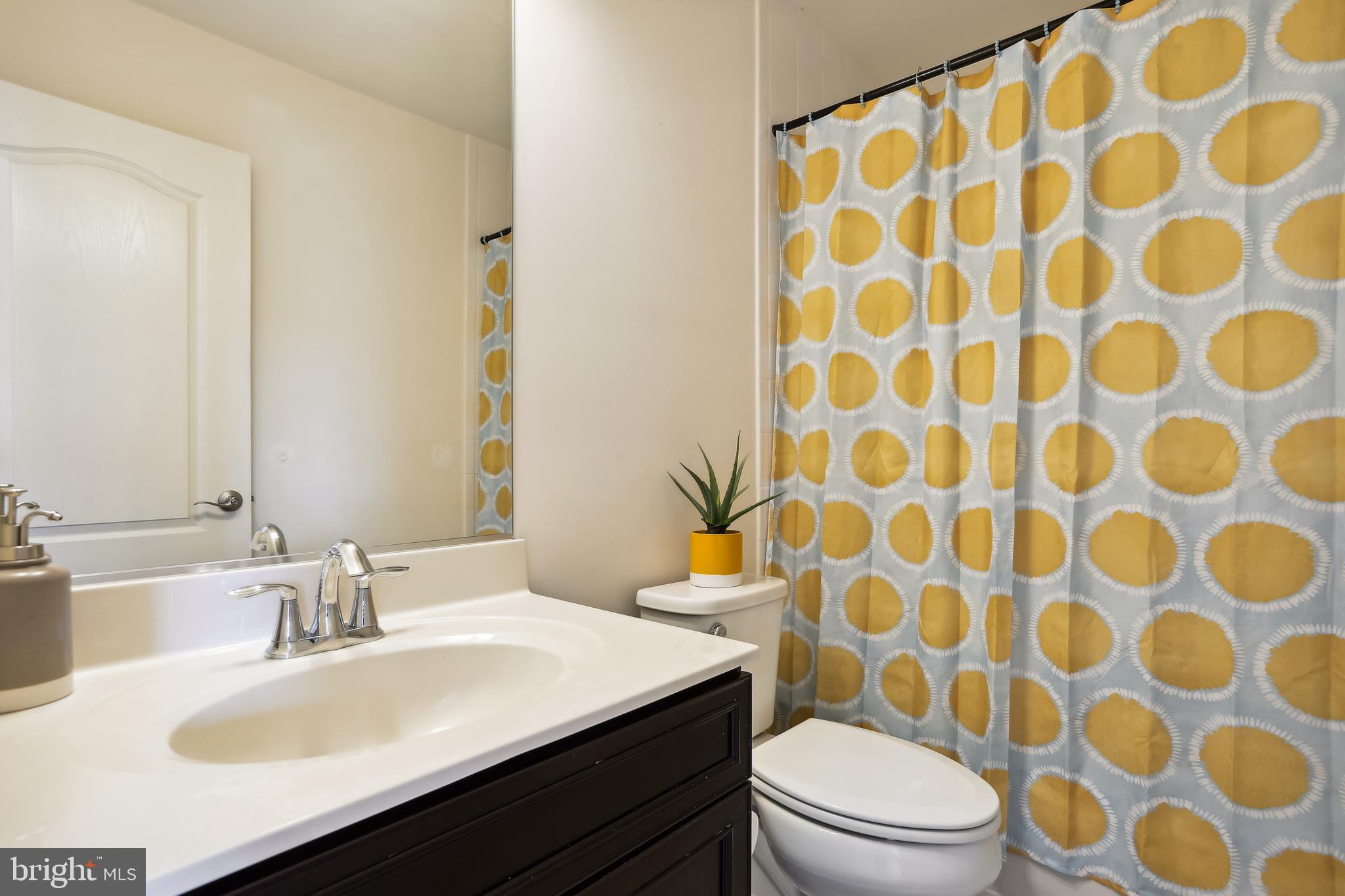 918 Winter Run Road Middle River, MD 21220 - Photo 21 of 44 a bathroom with a sink and a mirror