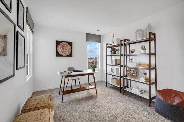 a view of a livingroom with shelves