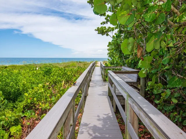 a view of balcony and yard
